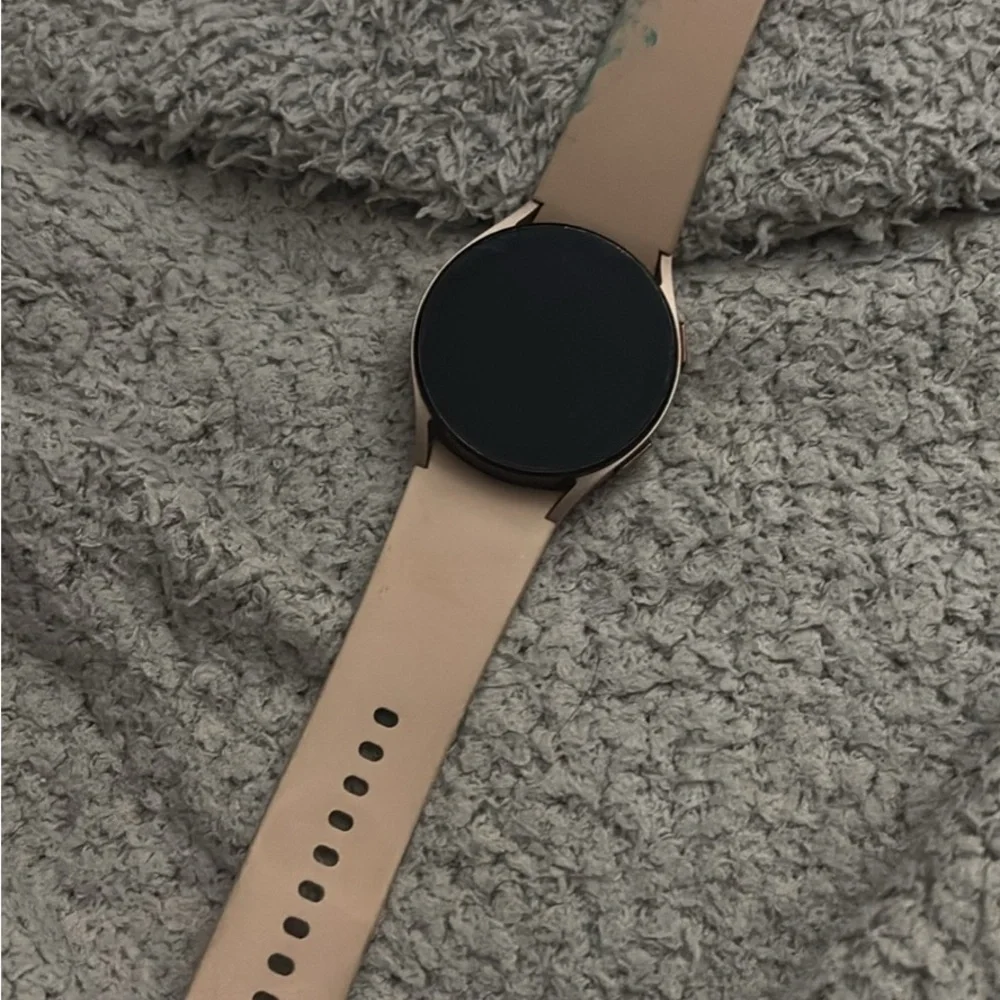 Samsung Smartwatch with Black Face and Tan Strap